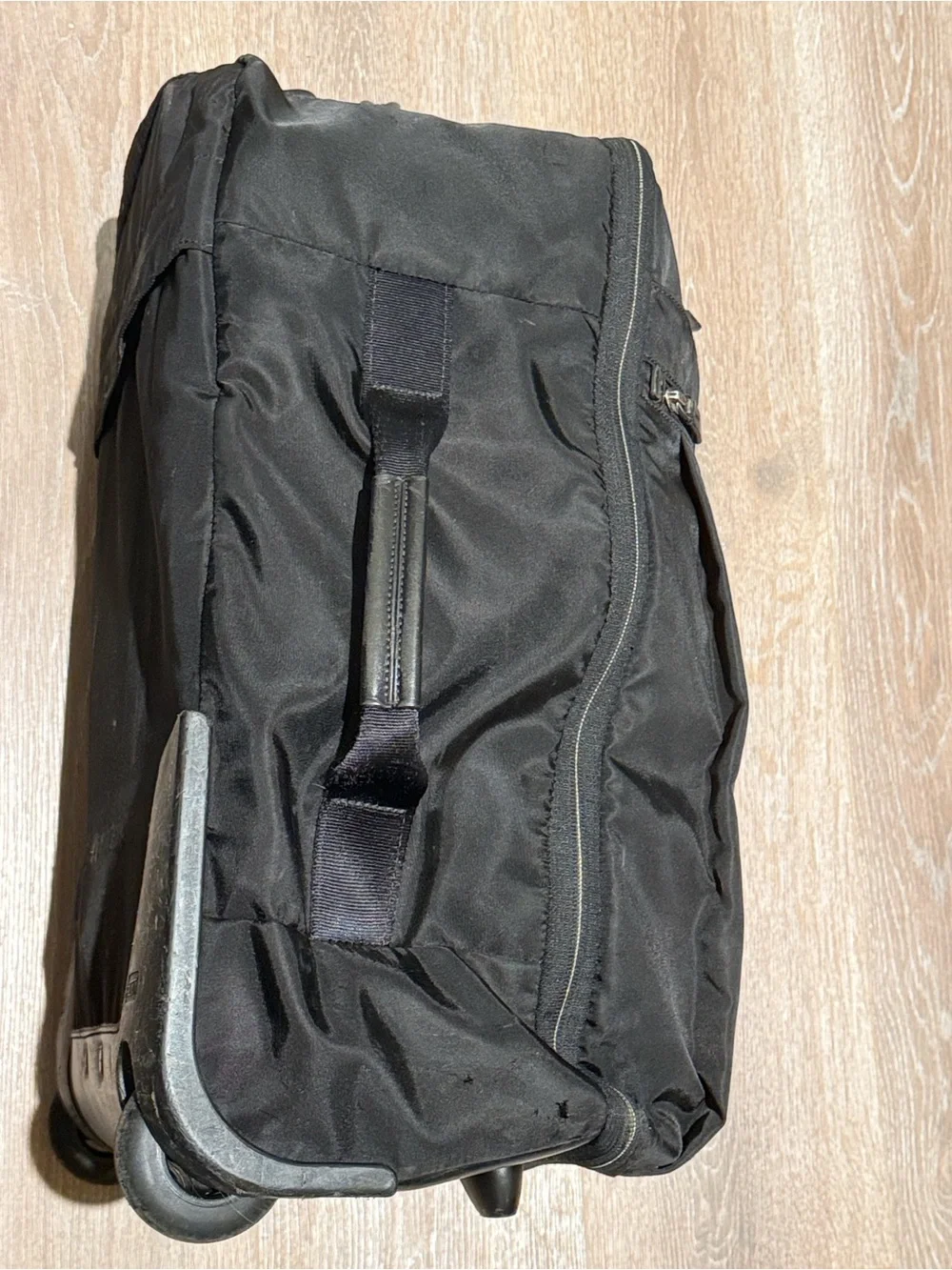 Tumi Black Ballistic Nylon Rolling Wheeled Carry-On Suitcase